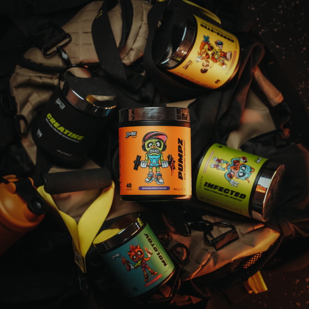 Zombie Labs Pumpz Preworkout tub highlighted alongside Infected Preworkout, Cross-Eyed Preworkout, Molotov Preworkout, and Creatine on top of a gym back with orange Zombie Labs shaker