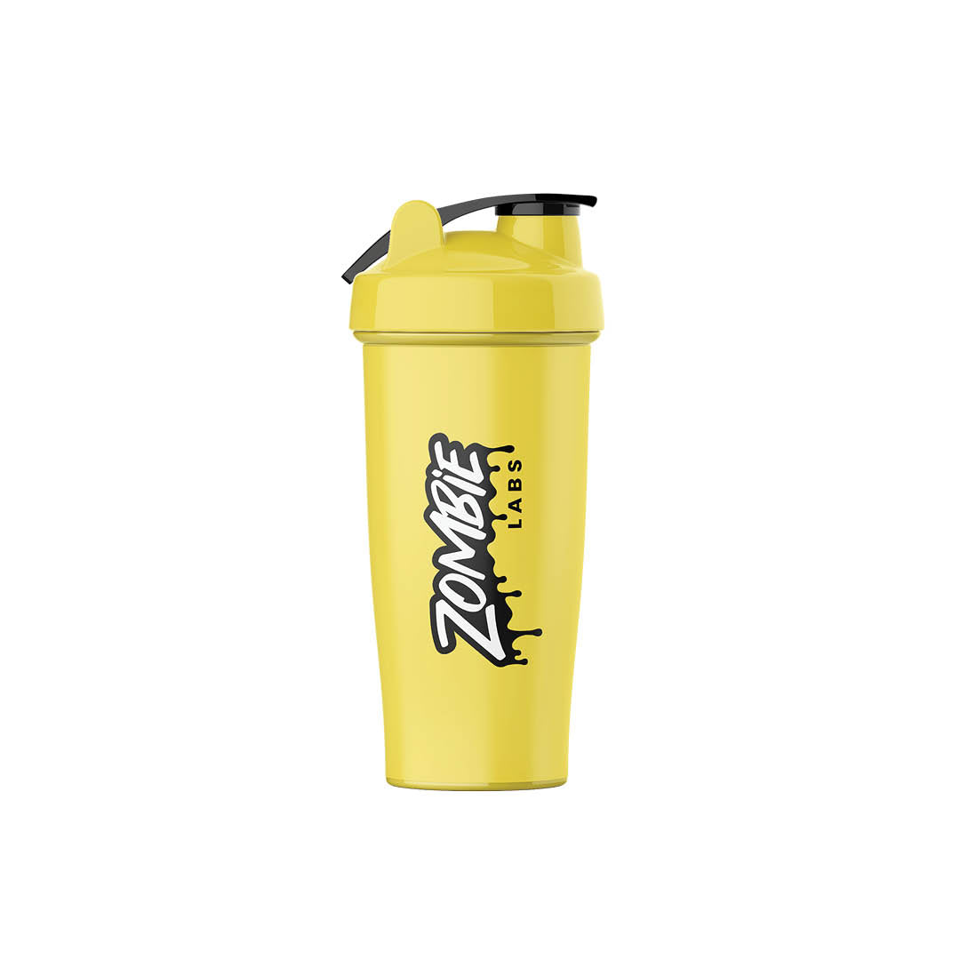 Zombie Labs Yellow Shaker Bottle - 700ml. This vibrant yellow shaker bottle features the bold Zombie Labs logo, perfect for mixing your favourite supplements on the go. Equipped with a secure flip-top lid and a durable design, it's an essential accessory for any fitness enthusiast.